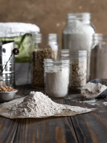 flours and grains in jars and bowls