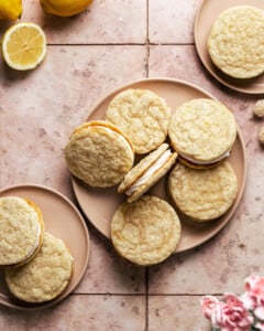 Lemon sandwich cookies on a pink plate