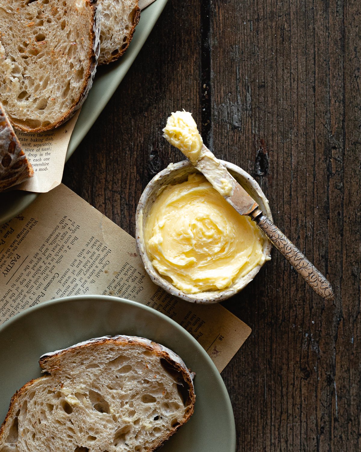 small bowl of soft butter with a butter knife