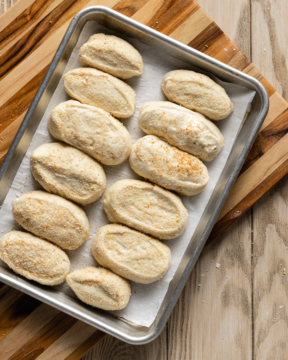 dough on a parchment-lined aluminum baking sheet