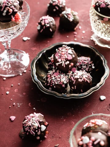 chocolate cake balls on a silver platter