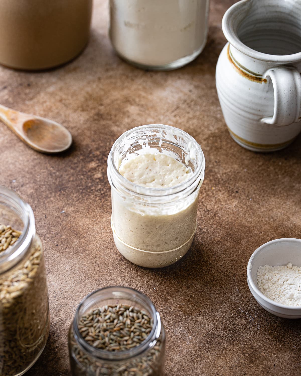 Bubbly jar of sourdough starter.