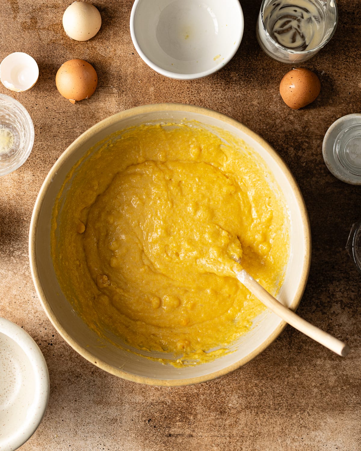 corn muffin batter in white bowl. 