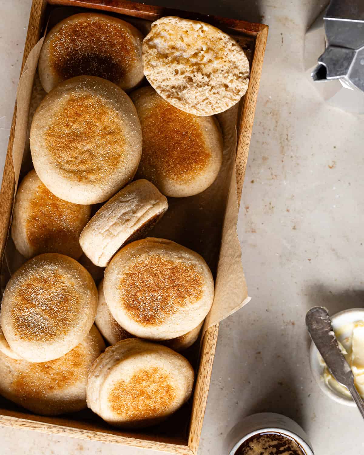 English muffins in wood tray. 