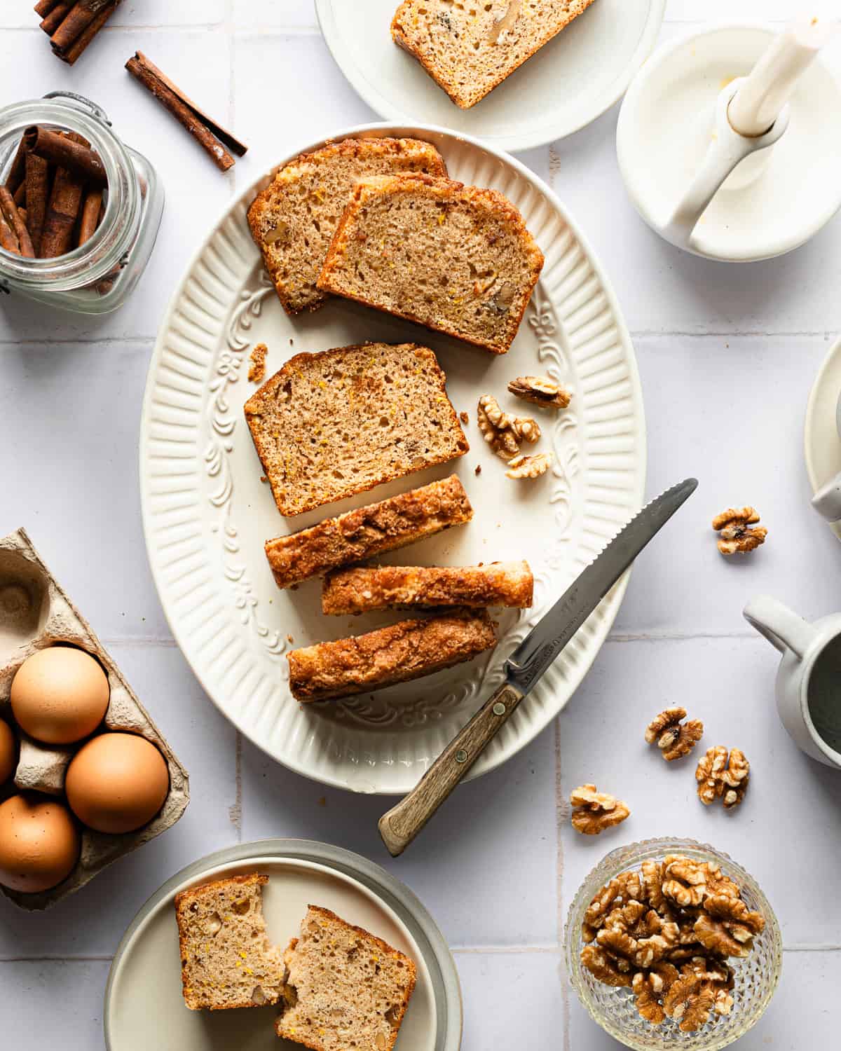 Slices of zucchini bread on a platter. 