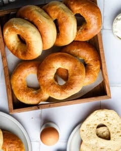 Egg Bagels in a square wooden tray.