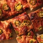 Close up of sliced focaccia pizza.